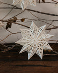 Set of 4 6in. Cream Paper Snowflakes