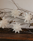 Set of 4 6in. Cream Paper Snowflakes